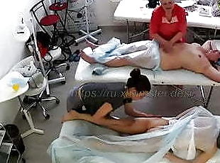 Mature woman and young girl on massage