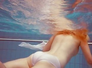 Hot babe Melisa Darkova dressed underwater