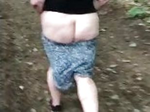 Big booty milf bare butt walking in the woods