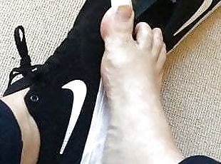 Bare foot taken out of trainers