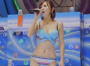 Slender asian teen sings us a song in bikini