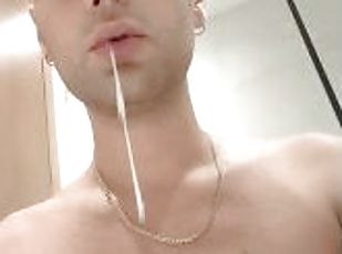 Spitting guys cum and licking it again in hotel bathroom - cum play