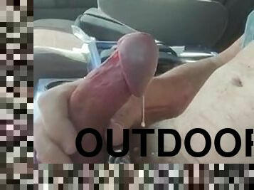 Masturbation in the car with a shackled penis and balls