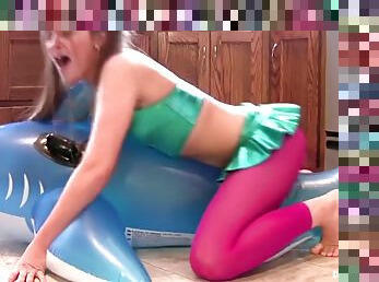 Horny slut grinds inflatable whale to orgasm