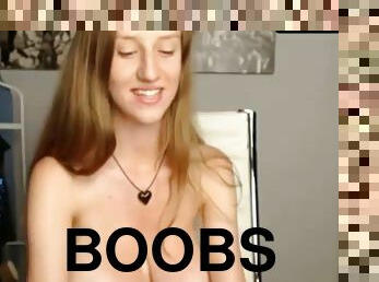 Slim teen shows off huge boobs