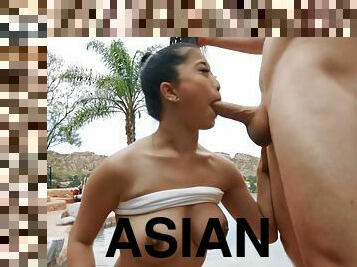 Asian cougar Jade Kush sucks and rides cock outdoors