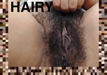 Very hairy vagina close up on webcam