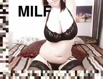 Milf shows massive boobs