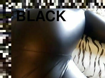 Black pantyhose under black wet look leggings