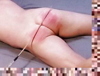Policeman Flogged by Spanking Machine with Rattan Cane on His Bare Buttocks Until Red & Welted