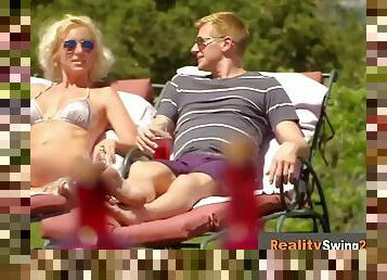 Swingers open up their legs and pants to welcome this amateur couple with hopes of a new lifestyle