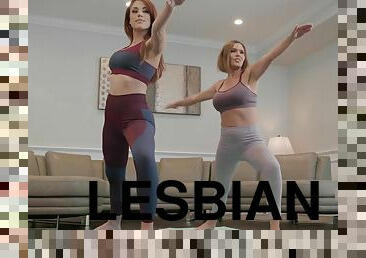 Two sporty lesbians with big boobs make love in the living room