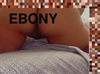Ebony shaking her ass while teasing her pussy with vibrator