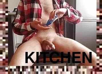 Guy jerking and cumming in the kitchen