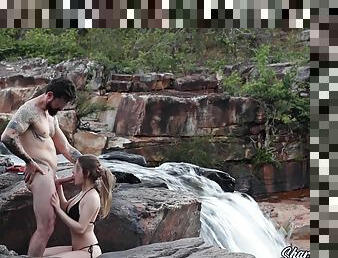 Blonde With Big Natural Breasts Makes Risky Public Sex In A Public Waterfall