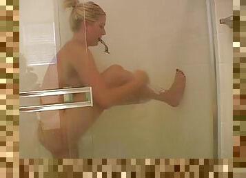 Blonde showers in bikini and gets naked