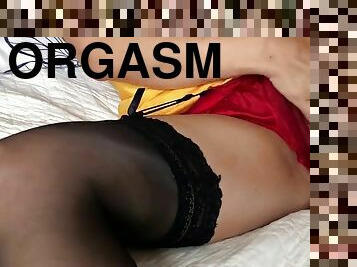 Orgasm through digital masturbation and vaginal penetration with dildo.