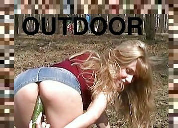 Hardcore blonde is masturbating her pussy outdoors