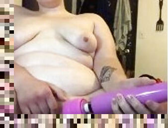 chubby babe rubs hard clit with wand