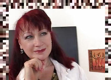 Mature redhead paintress gives head and doggystyled