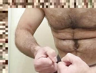 HAIRY MUSCLE BEAR FLEXING IN BLACK BOXER BRIEFS