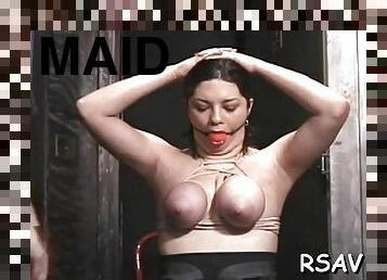 Kinky maid sucks faux meat cock like a pro