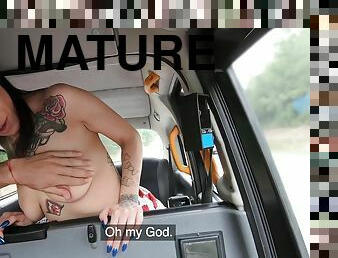 Inked mature gets an intense pussy pounding from her taxi driver