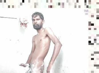 Rajeshplayboy993 showering and cumming in the bathroom