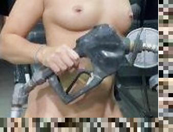 FIT BLONDE SLUT pumping gas completely naked