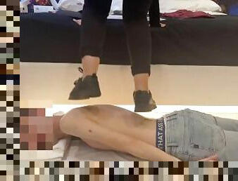 Hard trampling with black sneakers