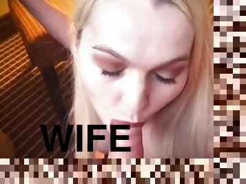 Hot wife smokes cigarette while giving cuckold bj and swallowing his cum in Nevada hotel room.