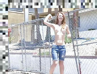 Gorgeous redhead shows off her great body in public solo scene