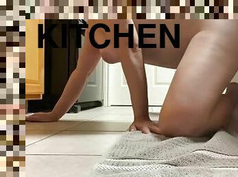 Kitchen MILF fucks a large Cock