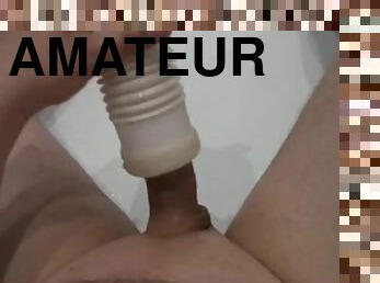 Masturbates with a toy and cums abundantly