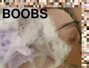Playing with boobs in shower