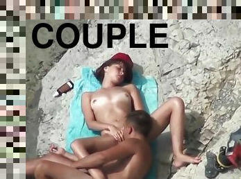 The couple was caught while masturbating on public beach