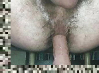 Dildo in hairy ass