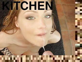 Redhead Sophie Lynx enjoys anal in the kitchen
