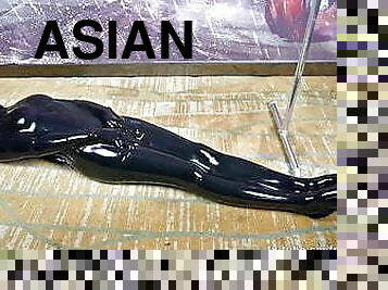 Asian cute latex slave girl Kiki in bondage and vacuum bag femdom