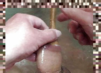 Bath-time foreskin with: wooden spoon 