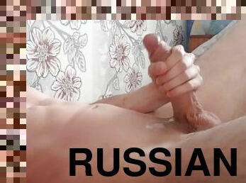 Pritty Russian teen jerking off his big cock and playing with his tight ass hole
