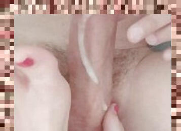 His big cock gets a footjob - cum on her red nails?