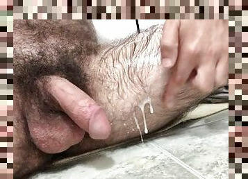 Solo amateur long hairy horny male I cum on my leg in the bathroom