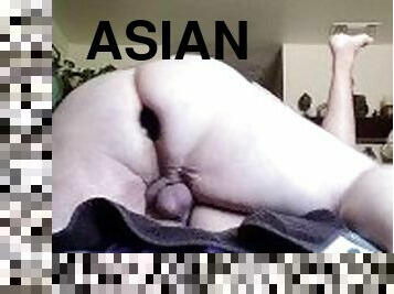 Pounding his raw asian hole while plugged