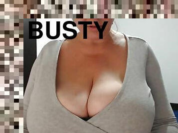 Busty cougar is teasing men with her huge boobs