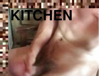 Horny guy jerks off in the kitchen