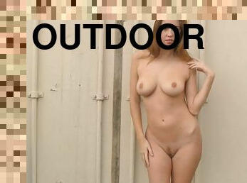 Beauty enjoying sensual outdoor solo