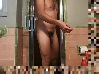 boy douching in the shower and using big dildo
