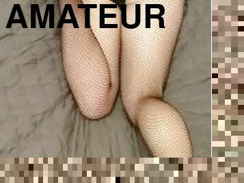 Fishnet stockings feet in heels