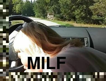 Milf sucking dick on the parking by the public road. Public sock sucking and cumshot